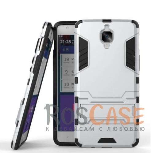 Ударопрочный чехол-подставка Transformer для OnePlus 3 / OnePlus 3T с мощной защитой корпуса (Серебряный / Satin Silver) Ударопрочный чехол-подставка Transformer для OnePlus 3 / OnePlus 3T с мощной защитой корпуса (Серебряный / Satin Silver)Описание:подходит для OnePlus 3 / OnePlus 3T;материалы: термополиуретан, поликарбонат;формат: накладка. Особенности:функциональные вырезы;функция подставки;двойная степень защиты;защита от механических повреждений;не скользит в руках.<br><br>Тип: Чехол<br>Бренд: Epik<br>Материал: TPU