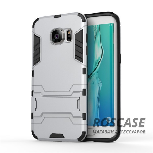 Ударопрочный чехол-подставка Transformer для Samsung G935F Galaxy S7 Edge с мощной защитой корпуса (Серебряный / Satin Silver) Ударопрочный чехол-подставка Transformer для Samsung G935F Galaxy S7 Edge с мощной защитой корпуса (Серебряный / Satin Silver)Описание:подходит для Samsung G935F Galaxy S7 Edge;материалы: термополиуретан, поликарбонат;формат: накладка. Особенности:функциональные вырезы;функция подставки;двойная степень защиты;защита от механических повреждений;не скользит в руках.<br><br>Тип: Чехол<br>Бренд: Epik<br>Материал: TPU